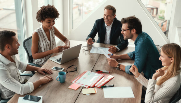 group of diverse business colleagues in a meeting room