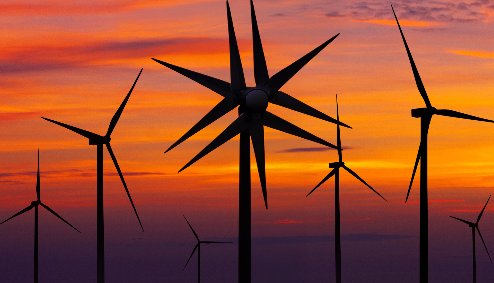 wind turbines at sunset