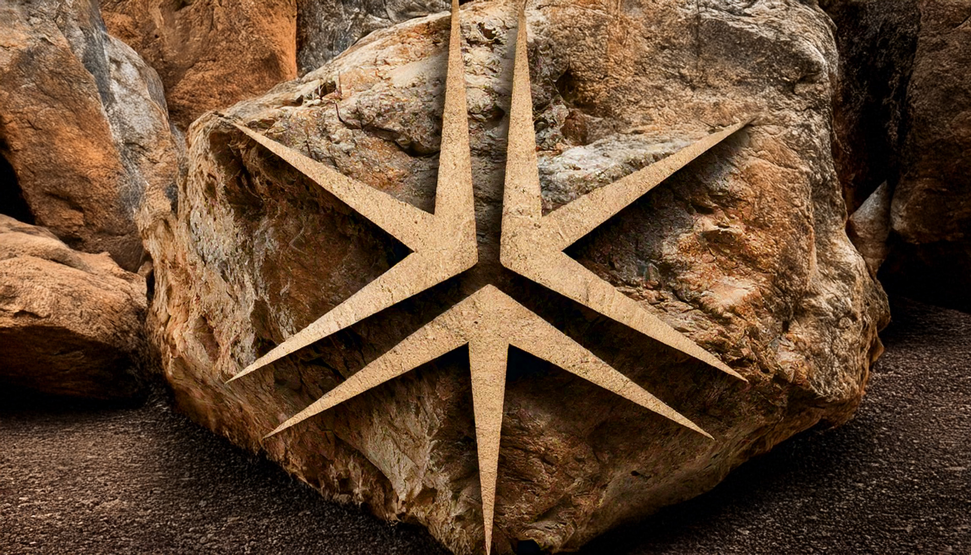 Miller Thomson spark carved into a large boulder