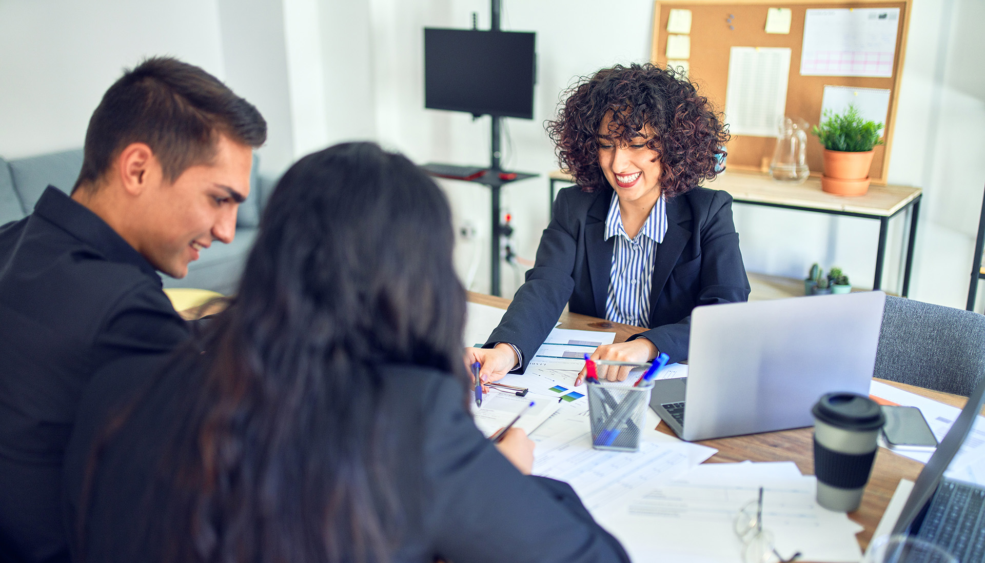 Young couple meeting with financial advisor
