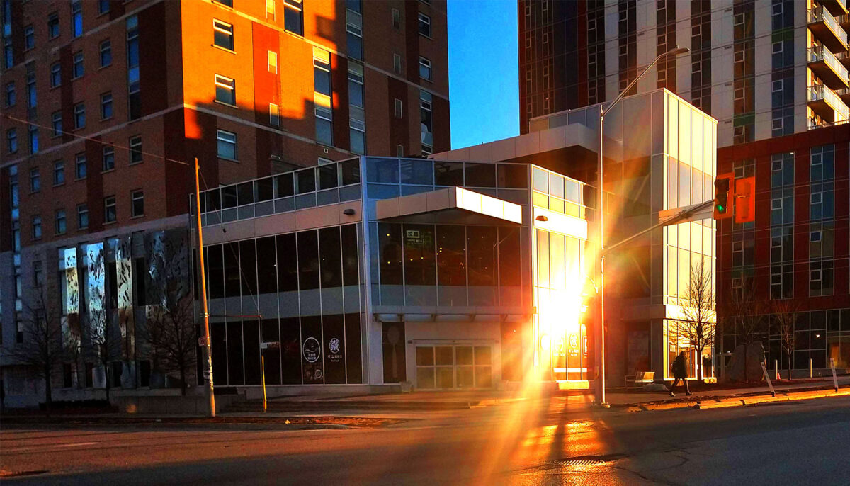 sunlight reflecting of an office building in Waterloo, Ontario, Canada