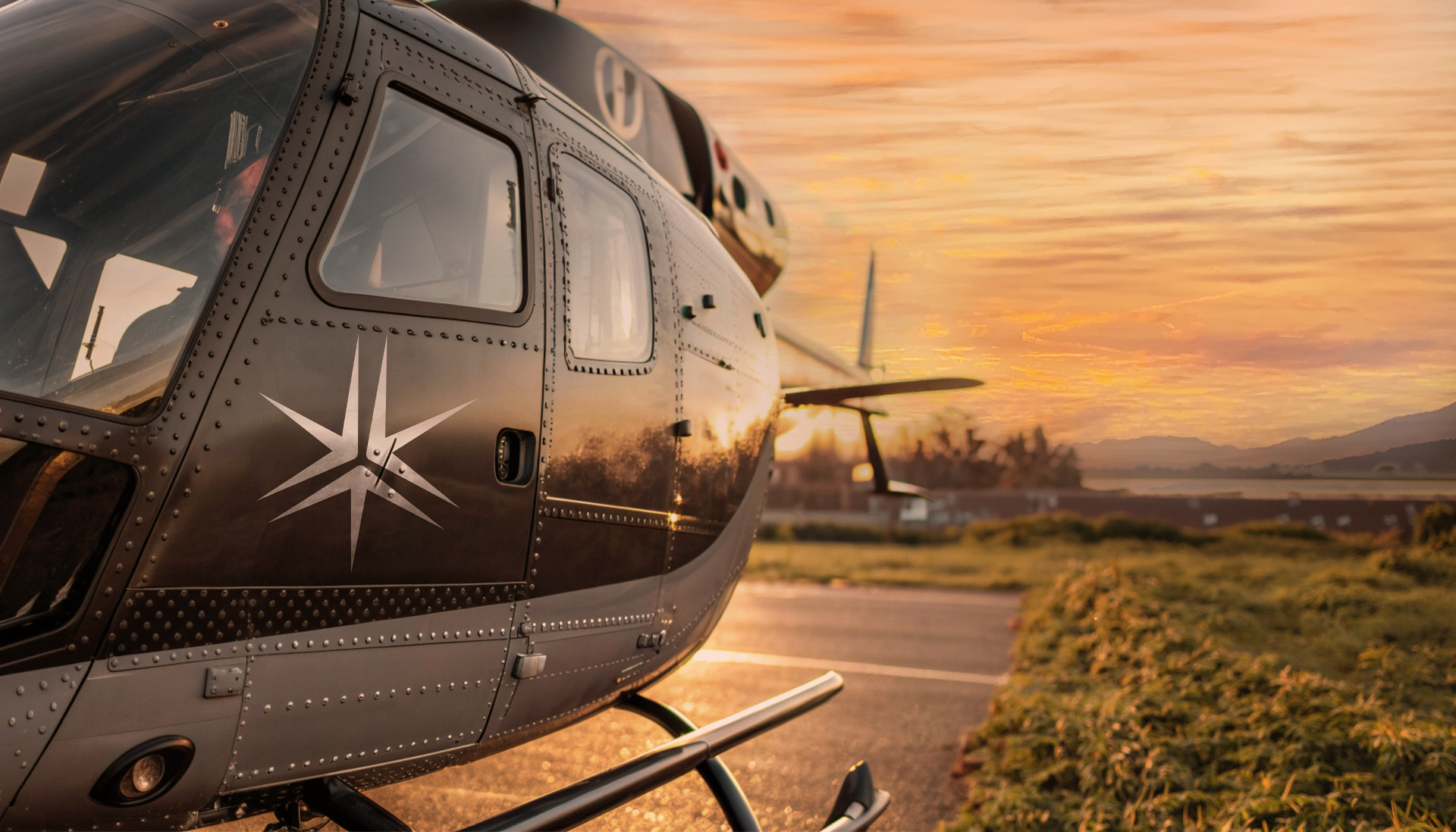 Helicopter preparing to take off at sunrise