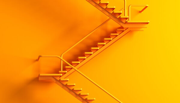 Minimalist orange staircase with two flights of stairs and matching handrails ascending diagonally across a monochromatic orange and yellow background